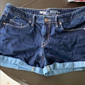 Super stretchy dark navy jean shorts.